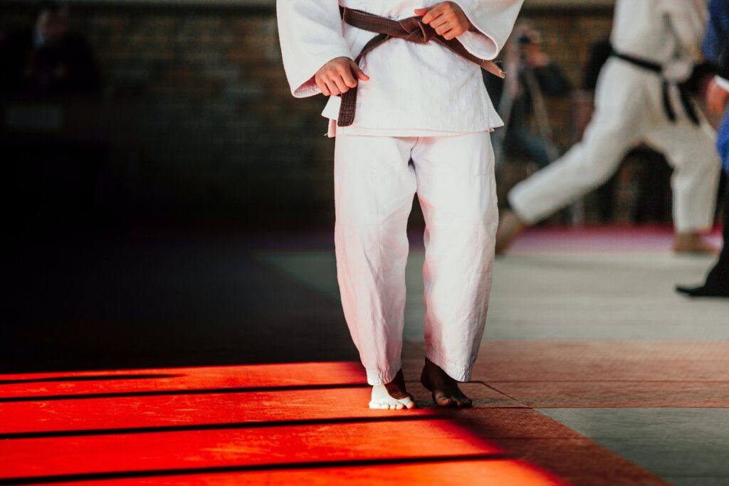 athlete judoka in white kimono